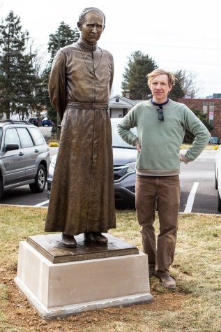 Matt Weir ’99 Honors School Founder With Statue