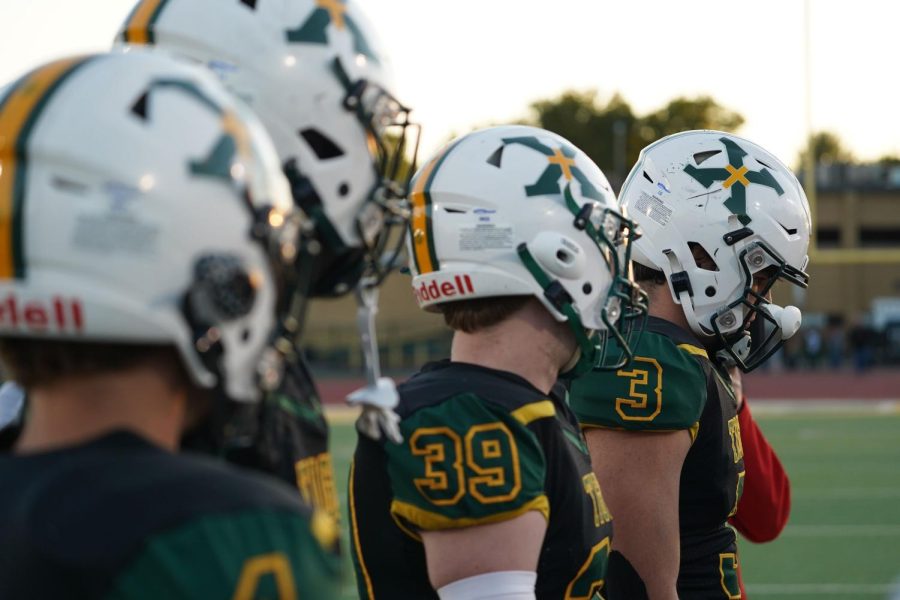 Game captains at midfield of this historic Louisville high school rivalry