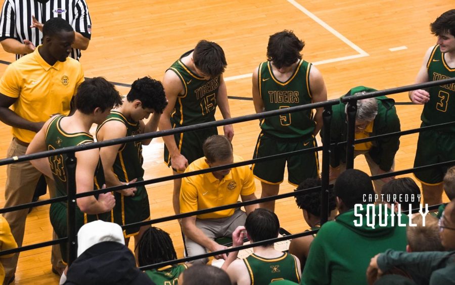 The team draws up a play during their season opener against Central