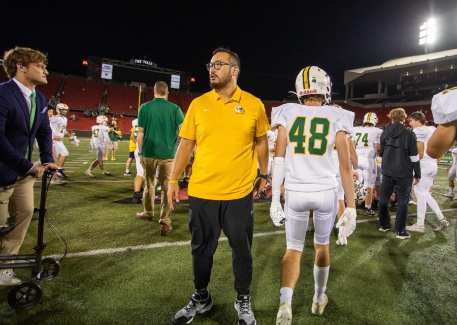 Coach Baisch during pregame warmups before the 2021 Trinity game (M. Haas)