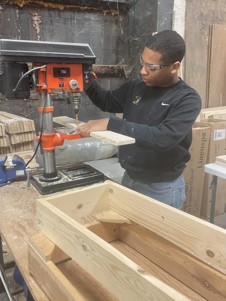 St. X senior Angelo Centeno working on a new bed