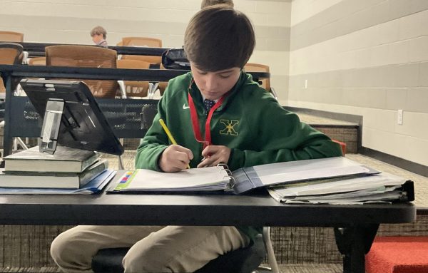 Freshman, Grant Locke, preparing for the midterms in a studious manner (Liam Whelan)