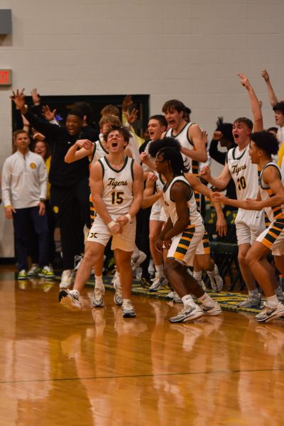 Schubert celebrates with teammates after hitting buzzer beater (photo used with permission from Jack Bates)