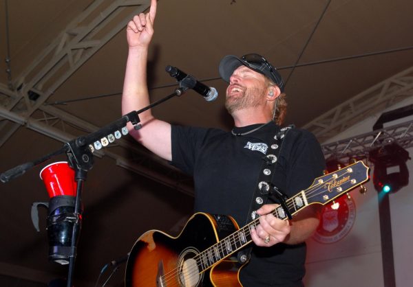 Playing to the base: Toby Keith sings at Camp Buehring during his Live In Overdrive USO tour (Photo courtesy of 4th Battalion, 118th Infantry Regiment, Sgt. 1st Class Raymond Drumsta)