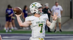 Mason Trimble throwing the ball vs Elder (photo used with permission of Jack Bates)