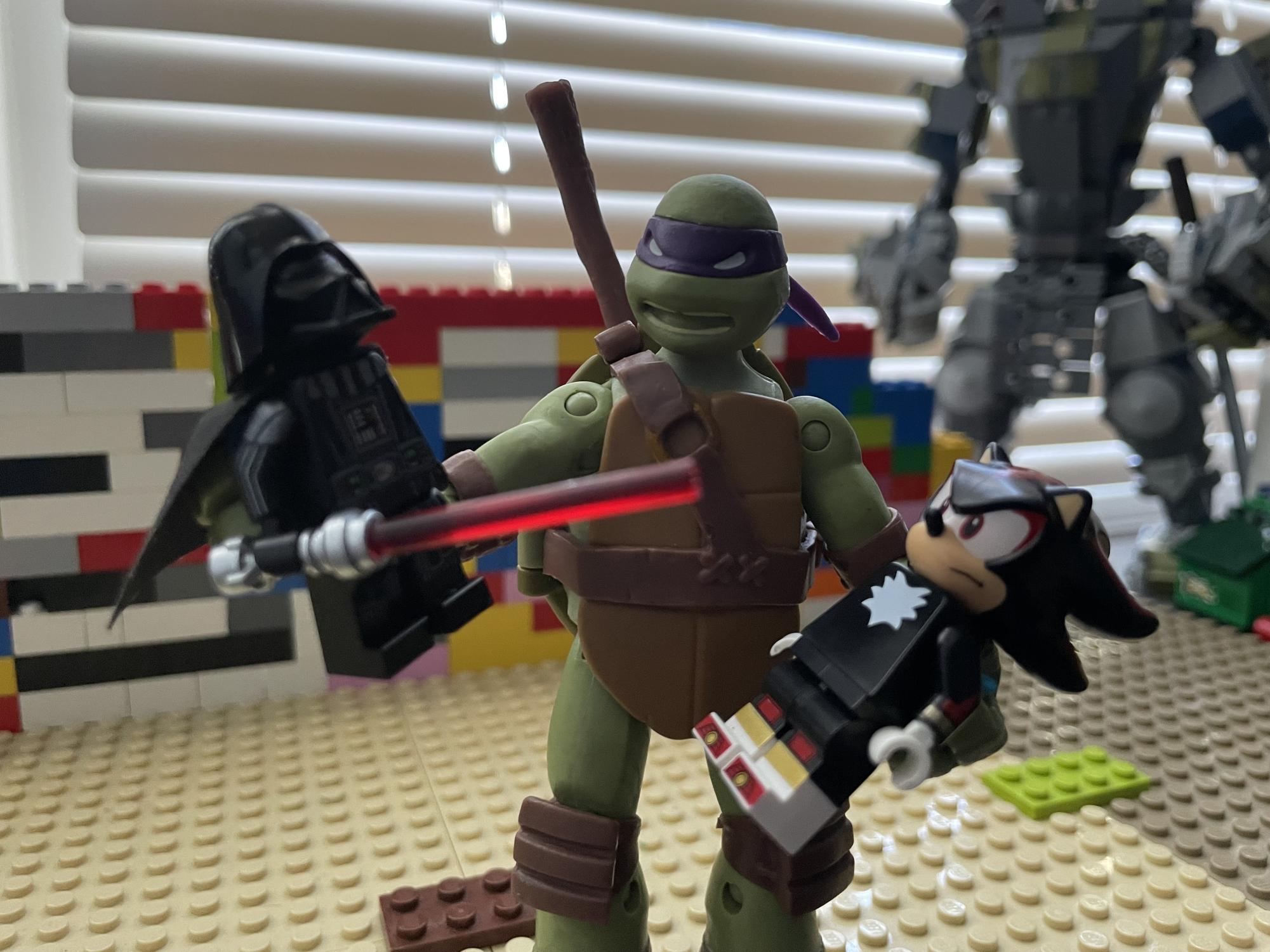 Donatello coming up with a new story for his figures. 