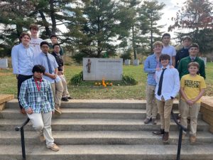 Group of St. X students in front of the Brothers' Cemetery (Photo by Mr. Stuber) 