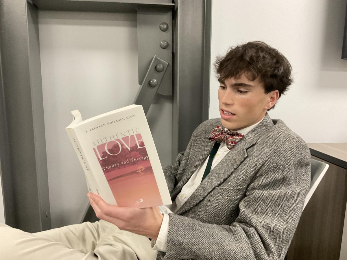 William Norris brushing up on love (Photo by Henry Corbell)