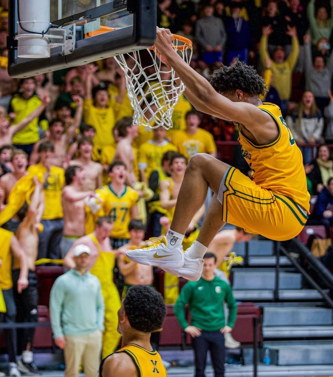 Jeremiah Jackson putting an exclamation point on the game in the final seconds (Photo by Jack Bates)
