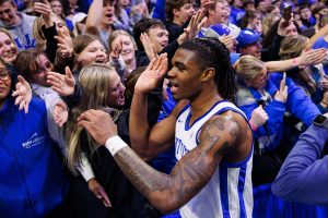 Feb 11, 2025; Lexington, Kentucky, USA; Kentucky Wildcats guard Otega Oweh (00) celebrates with fans in the student section after the game against the Tennessee Volunteers at Rupp Arena at Central Bank Center. Mandatory Credit: Jordan Prather-Imagn Images