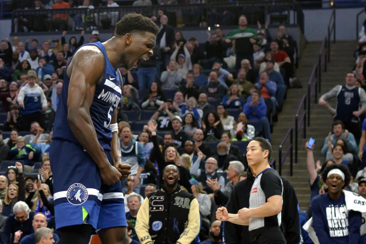 Feb 5, 2025; Minneapolis, Minnesota, USA; Minnesota Timberwolves guard Anthony Edwards (5) reacts after getting the basket and the foul against the Chicago Bulls during the third quarter at Target Center. Mandatory Credit: Nick Wosika-Imagn Images