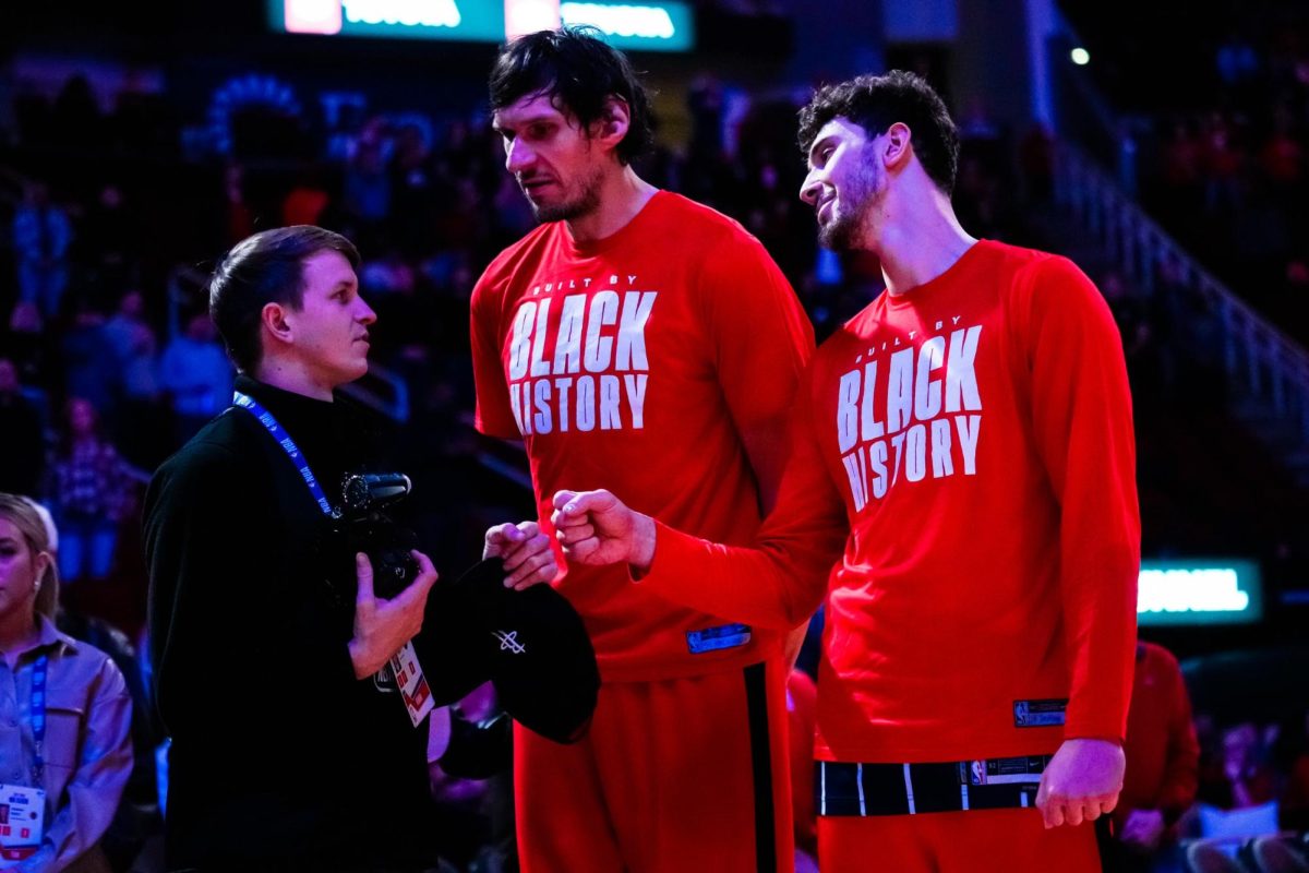 Riely with Boban Marjanović and Alperen Sengun (photo courtesy of Logan Riely)