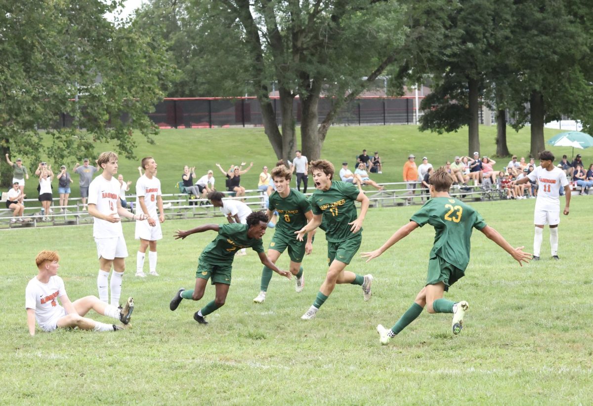 Tyler Dawahare, Reed Newman, and Brady Youssefi celebrating just after the goal (Photo courtesy of Lene Benoit)