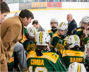 Coach Frank giving pre-game pep talk
