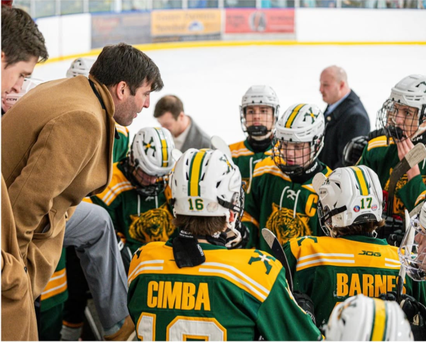 Coach Frank giving pre-game pep talk