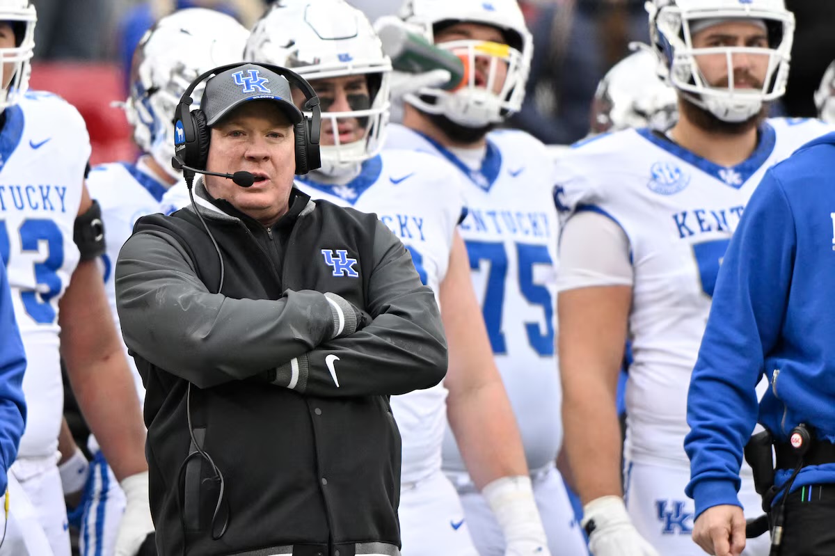 Nov 29, 2025; Louisville, Kentucky, USA; Kentucky Wildcats head coach Mark Stoops watches from the sideline during the second half against the Louisville Cardinals at L&N Federal Credit Union Stadium. Louisville defeated Kentucky 41-0. Mandatory