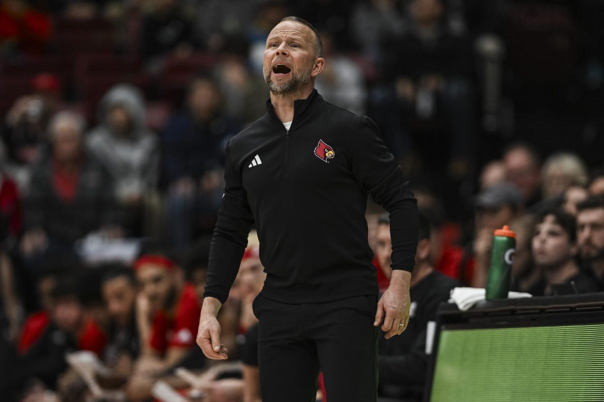 Jan 2, 2025; Stanford, California, USA; Louisville Cardinals head coach Pat Kelsey reacts during the first half against Stanford Cardinal at Maples Pavilion. Mandatory Credit: Justine Willard-Imagn Images