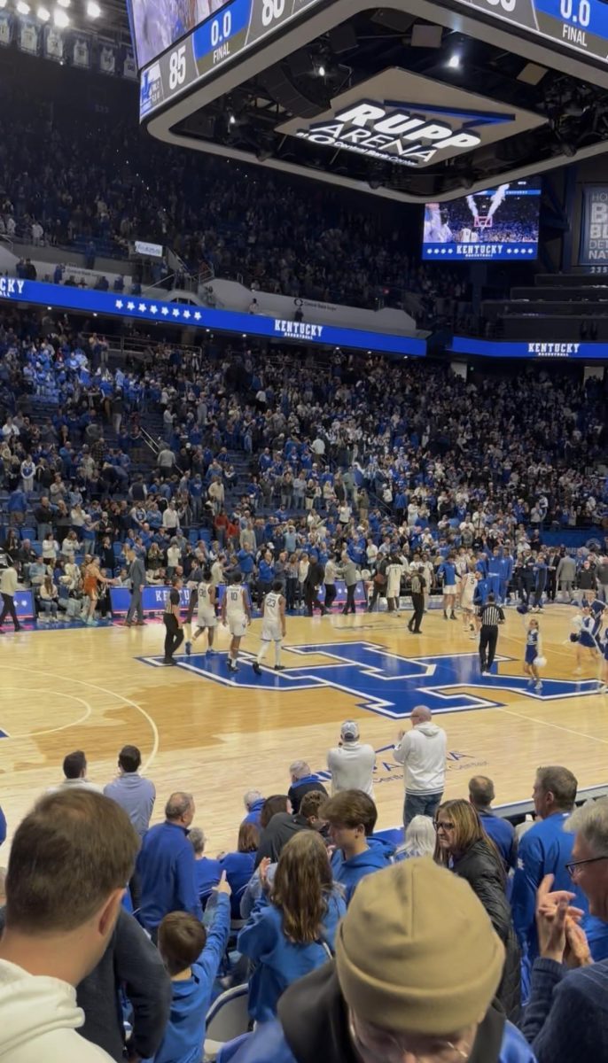 Kentucky fans celebrate after narrowly defeating Texas 85-80 at Rupp Arena for their 4th SEC win in a row.