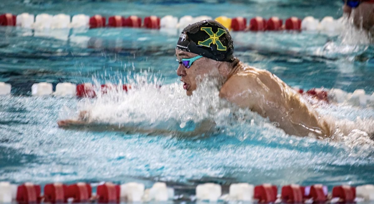Wilson York Swimming the 100 meter breaststroke. 
