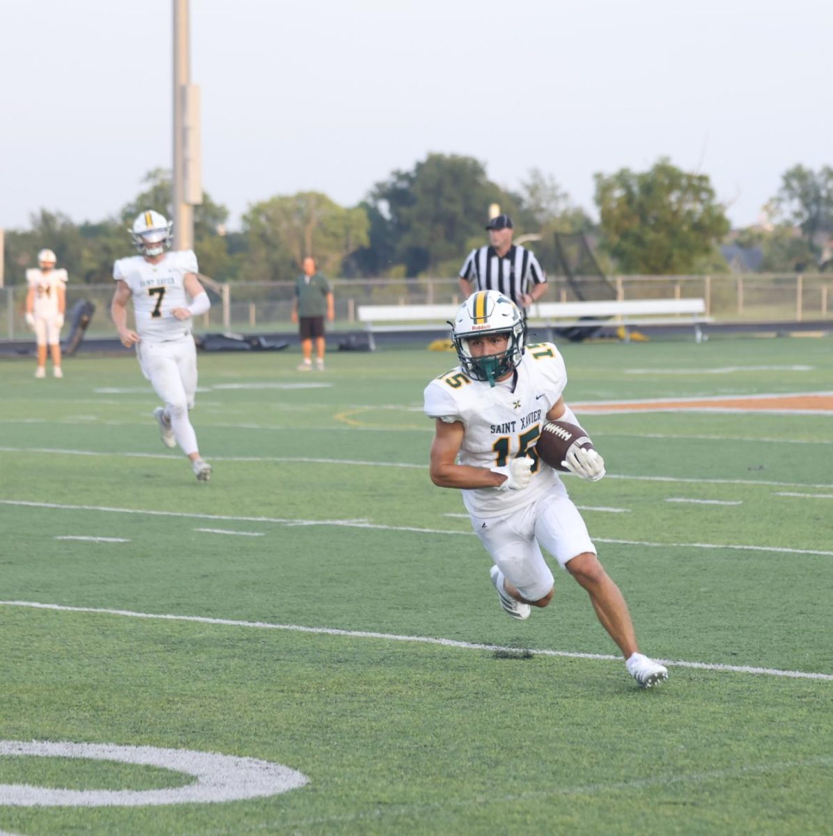 Mason Trimble completing a pass to Caden Barker