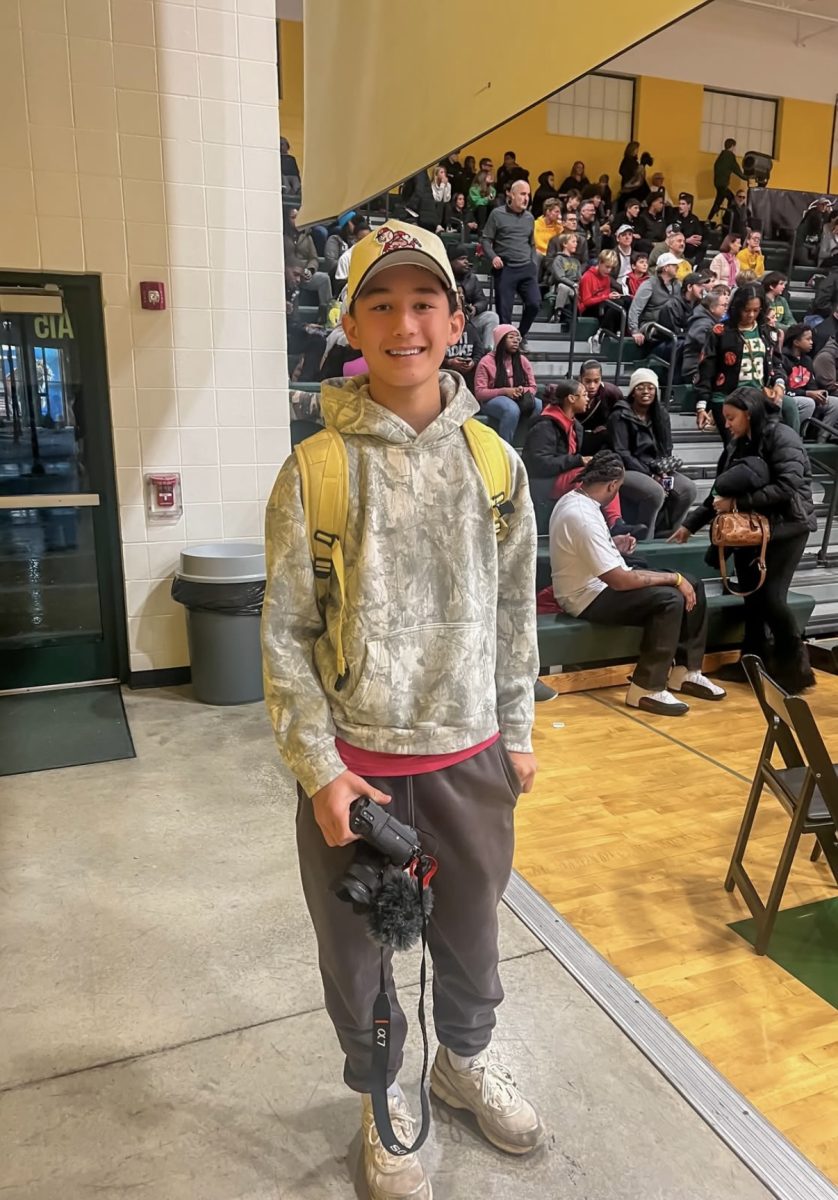 Foster Kang at a St. X basketball game