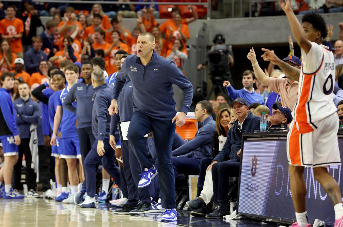 Feb 21, 2026; Auburn, Alabama, USA;  Kentucky Wildcats head coach Mark Pope reacts after his team was called for a foul during the second half against the Auburn Tigers at Neville Arena. Mandatory Credit: John Reed-Imagn Images