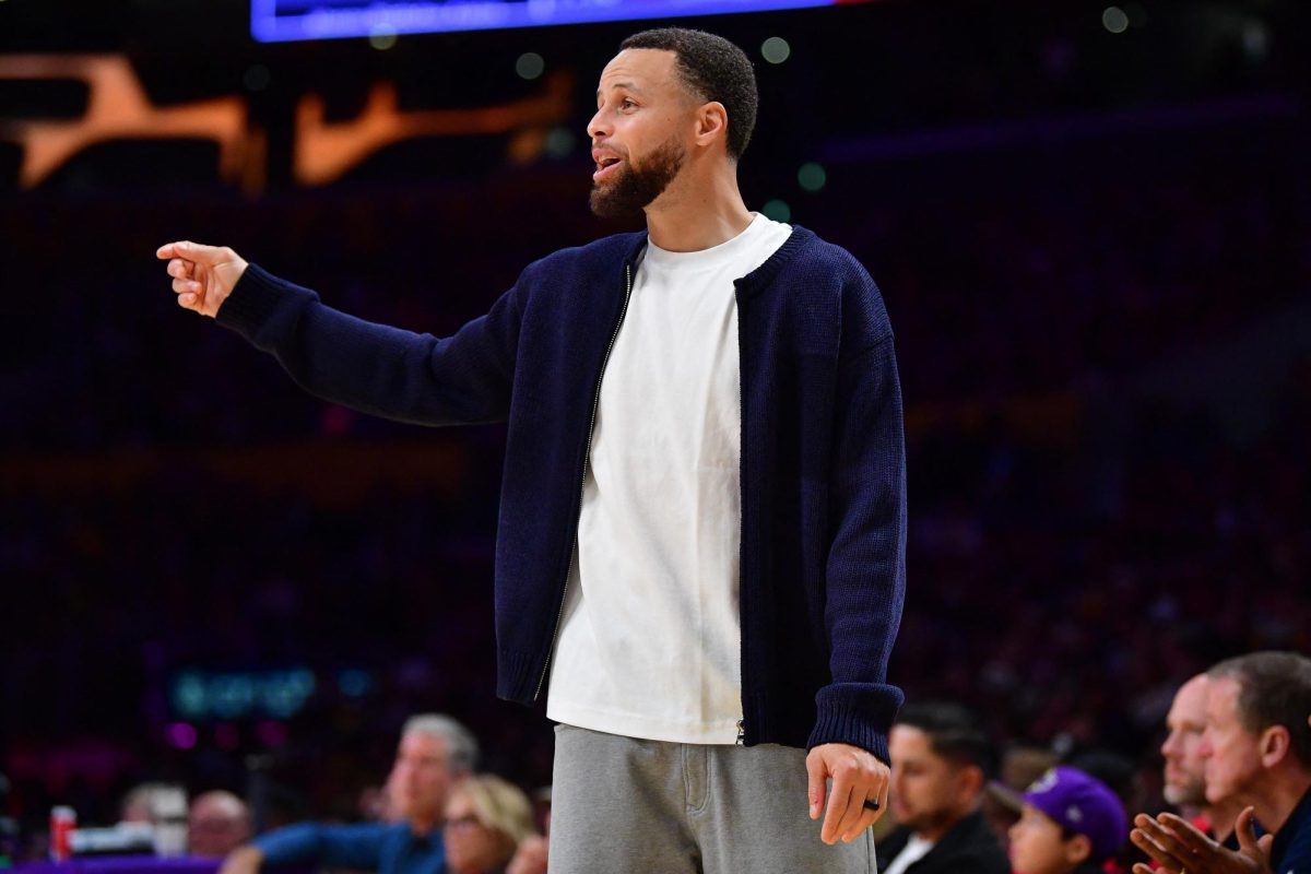 Feb 7, 2026; Los Angeles, California, USA; Golden State Warriors guard Stephen Curry (30) watches game action during the second half at Crypto.com Arena. Mandatory Credit: Gary A. Vasquez-Imagn Images