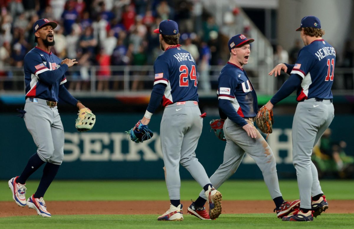 Mar 15, 2026; Miami, FL, United States; United States center fielder Byron Buxton (25), first baseman Bryce Harper (24), center fielder Pete Crow-Armstrong (4) and pitcher Mason Miller (19) celebrate after defeating the Dominican Republic in a semifinal game of the 2026 World Baseball Classic at loanDepot Park. Mandatory Credit: Sam Navarro-Imagn Images