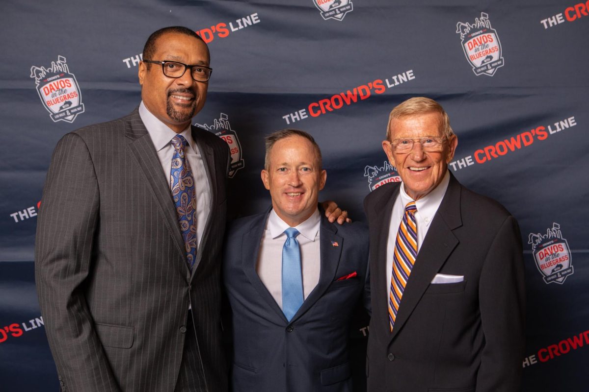 Mark May, Kevin Trimble, and Lou Holtz