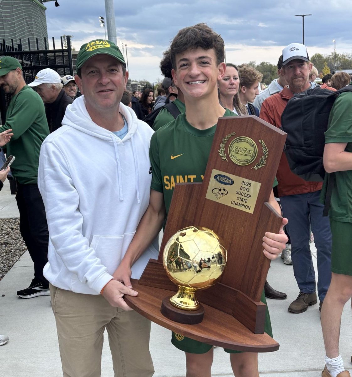 Logan Shulhafer ‘26 & Clay Shulhafer ‘93 after the 2025 State Soccer Championship 